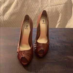 New Brown peep toe pumps.